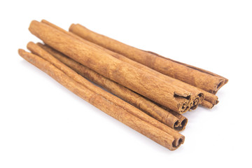 Cinnamon sticks isolated on white background with clipping path.