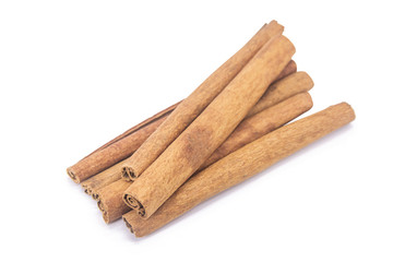 Cinnamon sticks isolated on white background with clipping path.