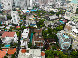 Naklejka premium Bangkok Metropolis, aerial view over the biggest city in Thailand. Bangkok skyline from Sukhumvit street. Aerial view of Bangkok skyline and skyscraper. Thailand