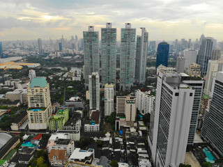 Bangkok Metropolis, aerial view over the biggest city in Thailand. Bangkok skyline from Sukhumvit street. Aerial view of Bangkok skyline and skyscraper. Thailand
