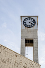 white clock tower on the top of a building