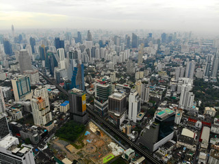 Obraz premium Bangkok Metropolis, aerial view over the biggest city in Thailand. Bangkok skyline from Sukhumvit street. Aerial view of Bangkok skyline and skyscraper. Thailand