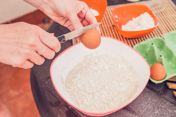 Cooking thin pancakes - kneading dough - adding eggs to dough