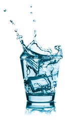 Ice Cube Falling into Glass of Water