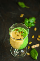 Smoothie, banana, avocado, chia seeds and more are healthy food concept. food background. top view