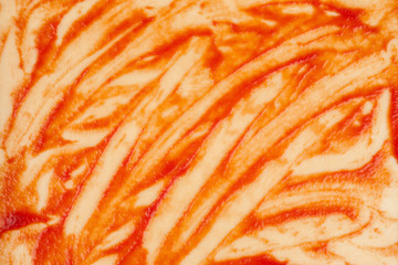 Smeared ketchup abstract texture, close-up shot