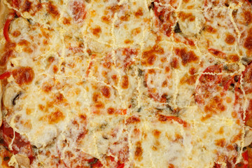 Cooked fresh pizza with cheese fragment, close-up shot, top view