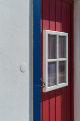 Vintage colorful red white and blue door vertical background