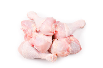 Tasty raw chicken legs. Top view. Isolated on white