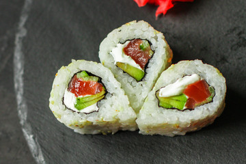 Sushi maki rolls (tuna, salmon, shrimp, avocado and other ingredients). japanese food. Top view, assorted sushi, you can eat menu. copy space