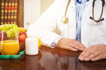 Nutritionist in office helps to patient