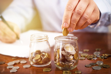 Man saving money, home budget