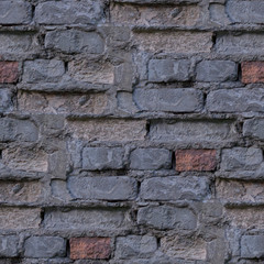 Seamless photo pattern of of fragment of broken grey wall.