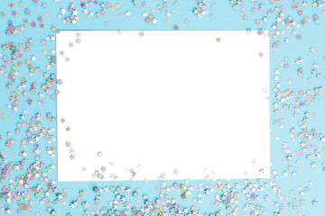 background with frame for your text. hologram laser silver stars on blue background. white copy space