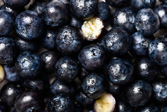 Close up of fresh summer berries such as blueberries, macro background image, top view