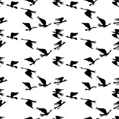 Seamless background of silhouettes of migratory geese in flight