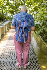 old man with backpack