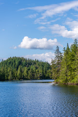 Fototapeta premium View at Mountain Lake with Blue Sky in British Columbia, Canada.