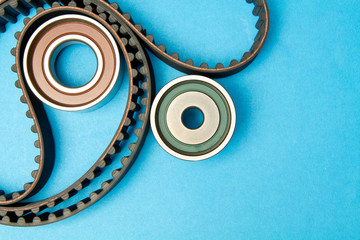 Timing belt with rollers on background .Kit of timing belt for car engine