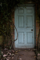 old wooden door with low light