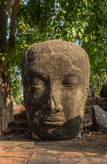 Fototapeta na wymiar Head sculpture in Wat Ratchaburana, Ayutthaya, Thailand