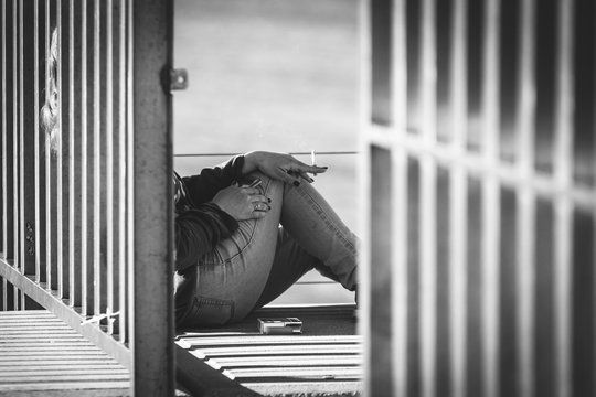 Girl Sitting On The Floor, Facing The Sea, Smoking A Cigarette, Thinking About Life, Melancholy, Reflecting On Life, Black And White