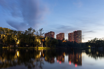 View from Zarechie park and riverbank on Nagornaya Street buildings in Troitsk city in the evening - Region of New Moscow