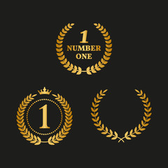 Set of golden laurel wreaths on black background.