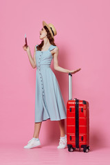 young woman with suitcase