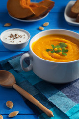 Creamy Pumpkin soup with seeds and parsley