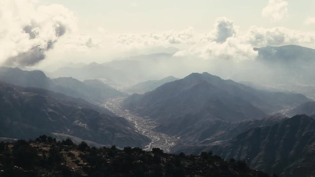 TIMELAPSE of clouds over a epic valley landscape in Asir Province, LOCKED OFF