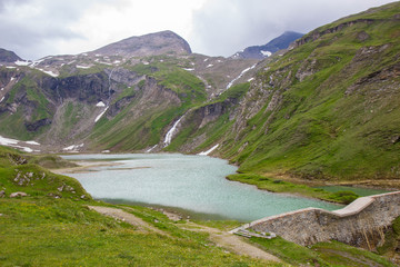 Fototapeta na wymiar High mountains lake at Grossglockner High Alpine Road 