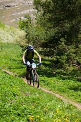 Fototapeta na wymiar Mountain biker on a trail