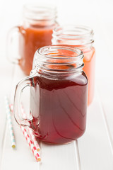 Glass of fruity juice.