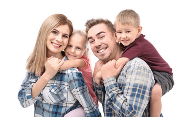 Portrait of happy family with little children on white background