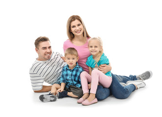 Fototapeta na wymiar Portrait of happy family with little children on white background