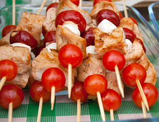 Chicken on a skewer with mozzarella and tomatoes