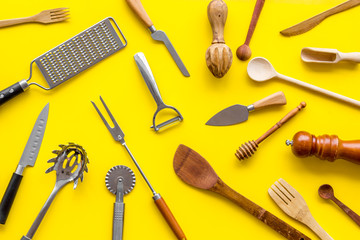 Cookware pattern on yellow background top view