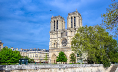 Fototapeta na wymiar Notre Dame Cathedral on the Seine River in Paris, France after the fire on April 15, 2019.