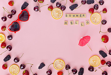 Top view of round frame made of summer fruits
