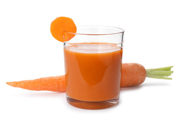 Carrot and glass of fresh juice on white background
