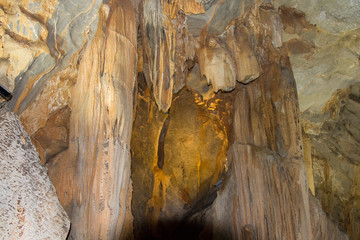 Ancient cave in the mountains of Alanya, Turkey. Beautiful stalactites and stalagmites. Dangerous.journey