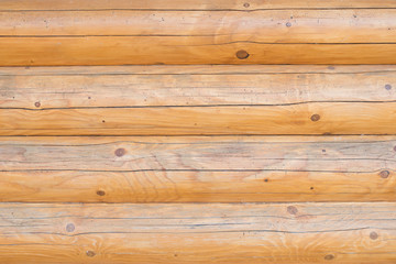 The texture of the wood. A wood background made of wood. A wooden fence.