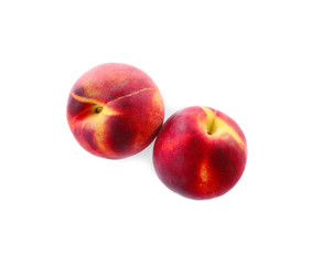 Fototapeta na wymiar Sweet juicy peaches on white background, top view