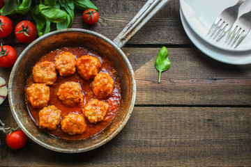 meatballs in tomato sauce (meat dish). food background. top view. copy space