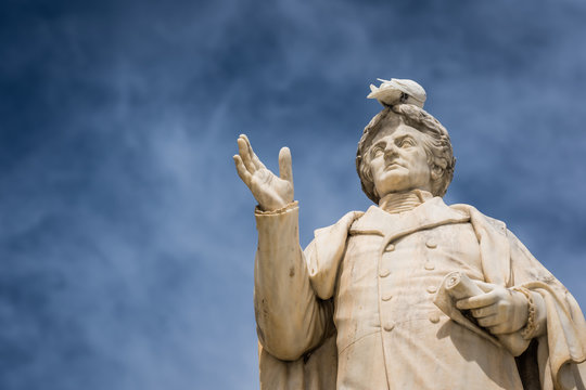 White Bird Sitting On Top Dionysios Solomos Statue