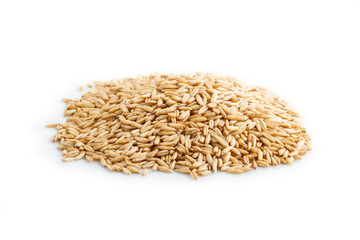 Heap of oats grains isolated on white background.