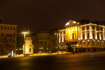 Fototapeta na wymiar empty streets of the night city with yellow lanterns. Night cityscape