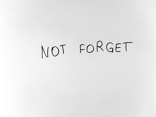 written in marker by hand text not forget