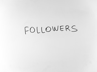 Fototapeta premium written in marker by hand text followers
